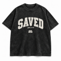 Saved tee, washed black, cracked varsity SAVED lettering with Rom 10:9