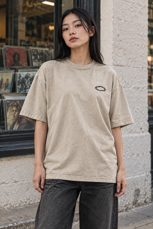 Woman outside a record store wearing the Crown of Thorns tee