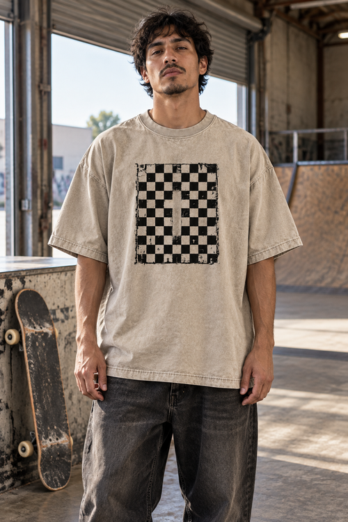 Guy in a skate warehouse wearing the Checkered Cross tee